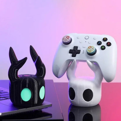 Soporte universal para mandos de videojuegos de Hollow Knight.